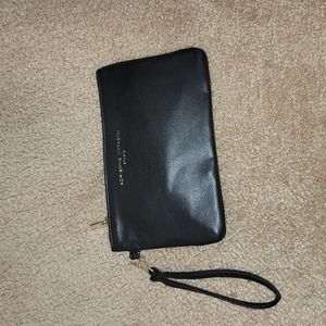 Black wristlet  with charger attached